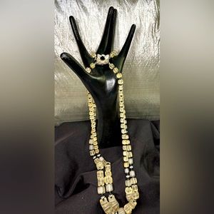 Glass beads, black jet beads & rhinestones.